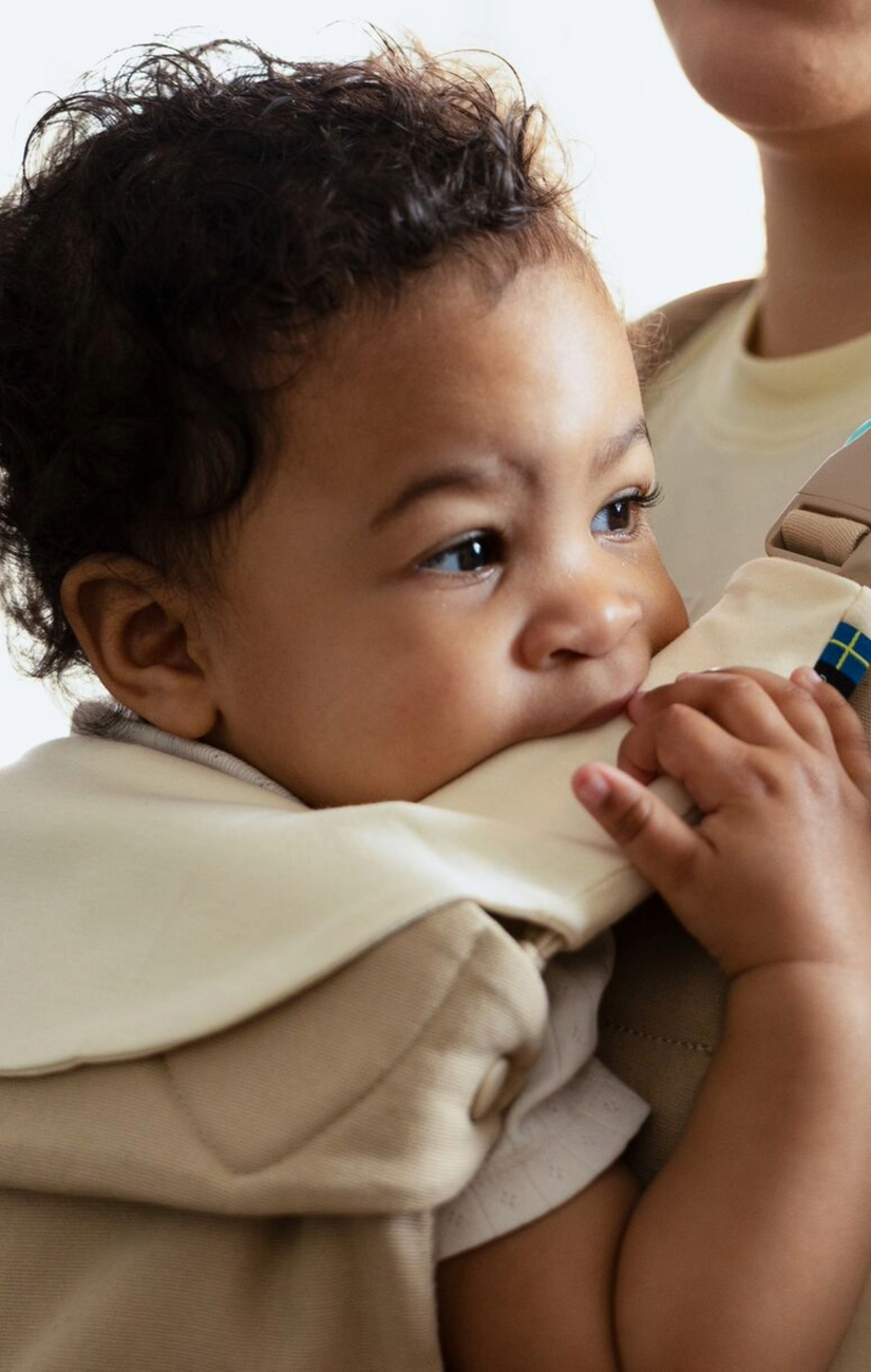 Coussinet de dentition et bavoir pour les porte-bébés